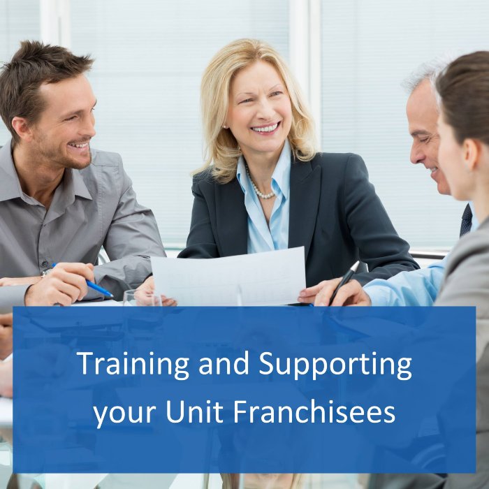 Board facilitator and board members image of a board facilitator training and supporting unit franchisees