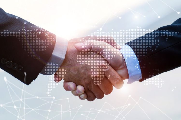 Business People Handshaking Two business people are shaking hands